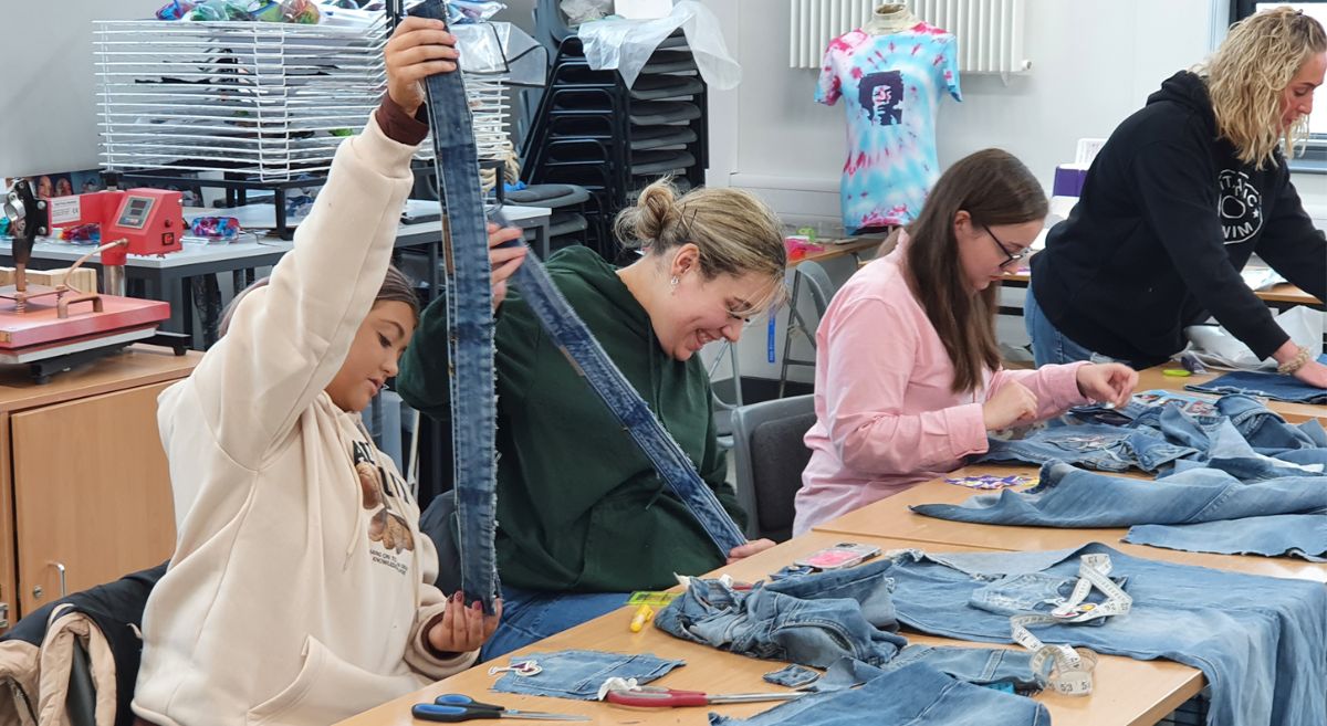 Students participating in an eco fashion workshop